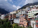 11 Zhangmu Tibet Zhangmu (Tib. Dram, Nep. Khasa, 2300m) is the Tibet border town just across from Kodari and is a major trading post between Tibet and Nepal. Zhangmu is built on a steep uphill street that twists through town in a series of tight switchbacks, lined with private homes, shops, restaurants and government buildings.